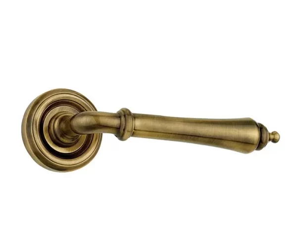 Camille Door Handle On Rose Antique Brass