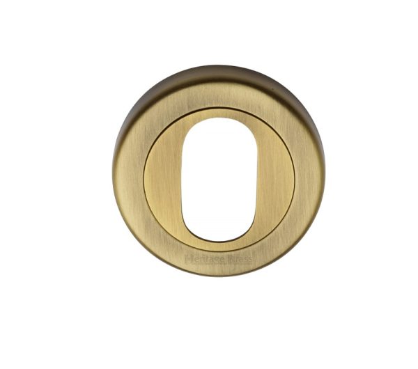 Heritage Brass Oval Profile Key Escutcheon, Antique Brass