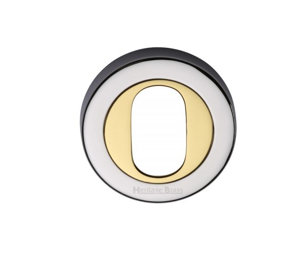 Heritage Brass Oval Profile Key Escutcheon Dual Finish, Polished Chrome With Polished Brass