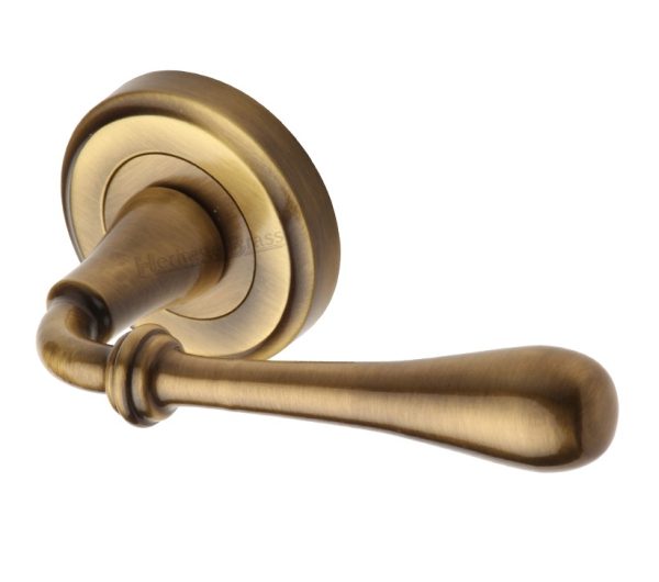 Heritage Brass Roma Antique Brass Door Handles On Round Rose